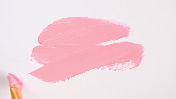 Abstract Brushstrokes of Pink Paint Brush Applied Isolated on a White Background