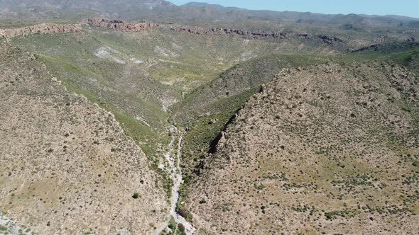 flying to a big crater while looking at the entrance