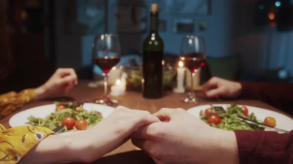 Romantic Couple Holding Hands Together During Happy Saint Valentine Day Dinner Man and Woman Lovers