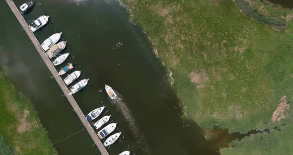 Panorama aerial view white boat floating on clear turquoise water