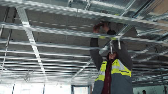 Installation of a Ceiling on Construction