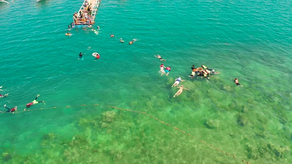 Tourists Snorkeling in the Lagoon Philippines El Nido