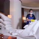 Hotel Staff in Protective Mask Removing Bedding - VideoHive Item for Sale