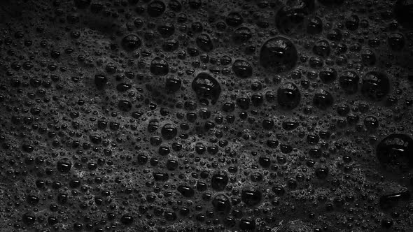 Black Foam With Bubbles Popping