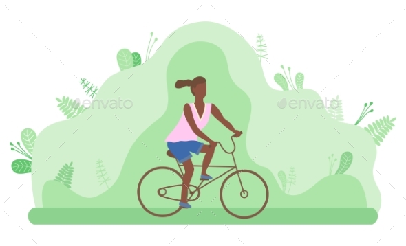 Young Girl Rides a Bicycle in a Forest or Park