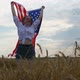 Happy Patriotic Young Woman Waves the US Flag and Jumps Into the Field - VideoHive Item for Sale