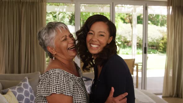 Mixed race mother and daughter spending time together