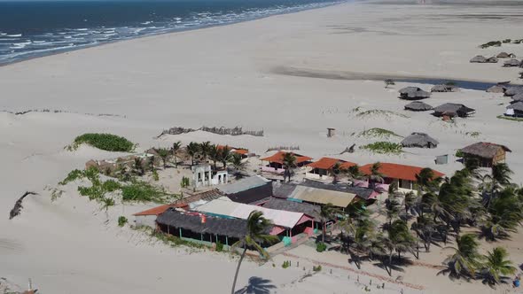 Sand dunes mountains and rain water lagoons at northeast brazilian paradise.