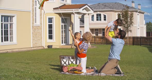 Family Enjoying Summer Weekend alt