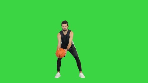 Male Basketball Player Giving a Pass on a Green Screen Chroma Key