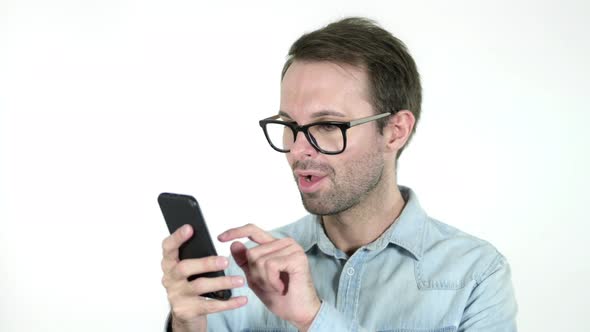 Man Excited for Success While Using Smartphone, White Background