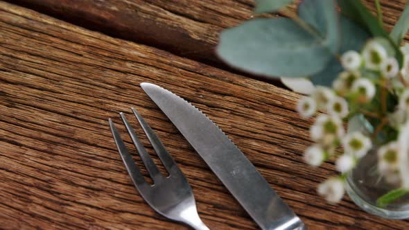 Various cutlery on wooden table 4k