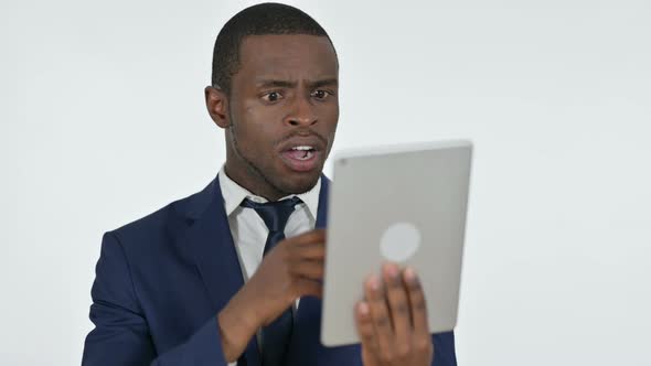 Video Chat on Tablet By African Businessman, White Background