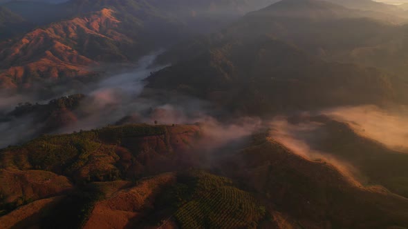 4K Aerial view over the mountains at sunset. Drone Flight Footage