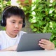 Asian boy using tablet to study online. - VideoHive Item for Sale