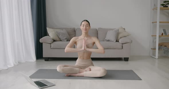 Fir Young Woman Doing Stretching Exercises at Home