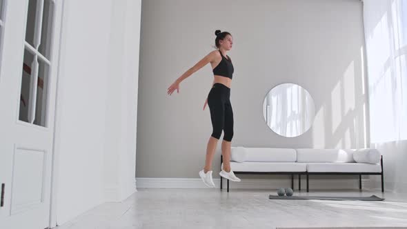 Fitness Woman Doing Burpee Workout at Home