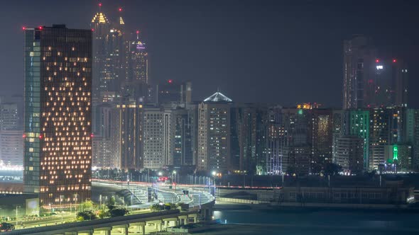 Buildings on Al Reem Island in Abu Dhabi Night Timelapse From Above