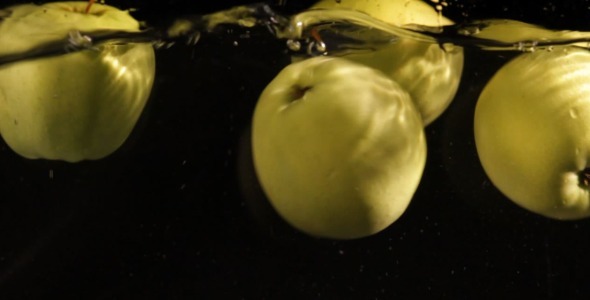 Fresh Green Apples in Water Slow Motion