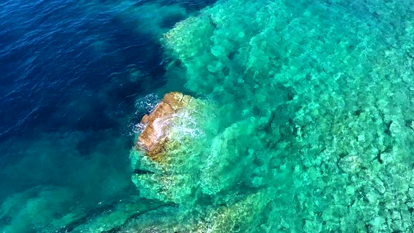 Small Islet Island Formed by the Accumulation of Rock Deposits Atop a Reef in the Sea