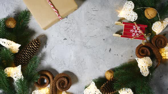 Christmassy Festive Decorations for Christmas and New Year. A Pair of Female Hands Move a Bandaged