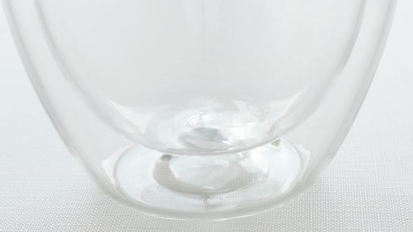 Filling modern glass with instant tea granules  4K video