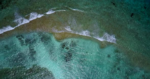 Wide angle fly over copy space shot of a summer white paradise sand beach and turquoise sea 