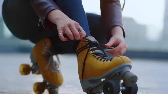 Unknown Roller Skater Preparing to Workout