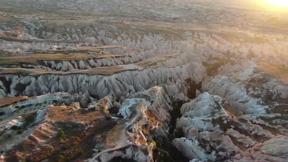 Aerial view of Red Valley and Rose Valley at sunset in Cappadocia, Turkey