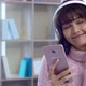 Young pretty woman enjoying with music at home - VideoHive Item for Sale