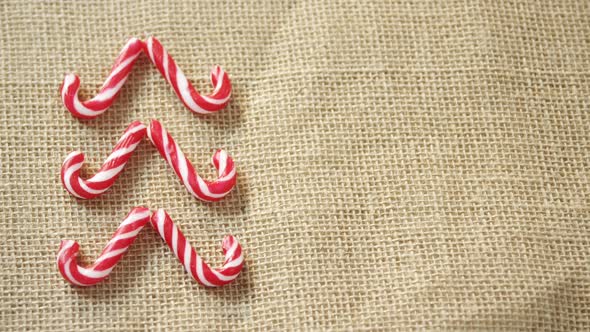 Candy cane arranged on textile