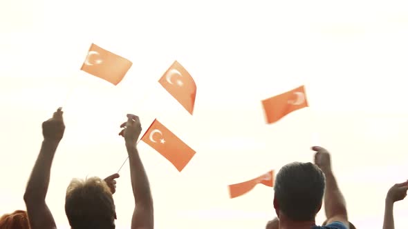 People Holding the Flags of Turkey