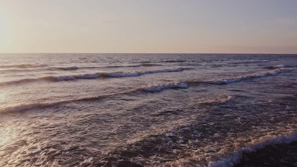 Large Foamy Waves at High Tide Drone Video