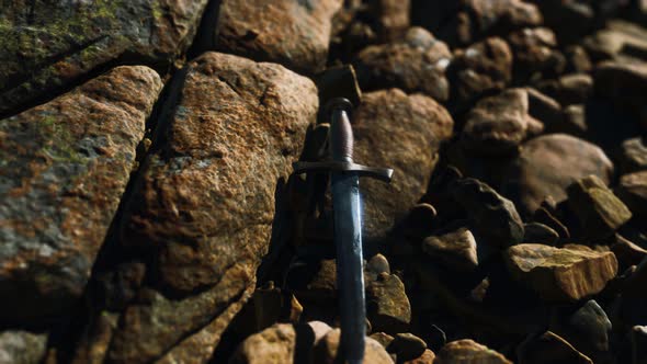 Old Dagger on the Rock at Sunset