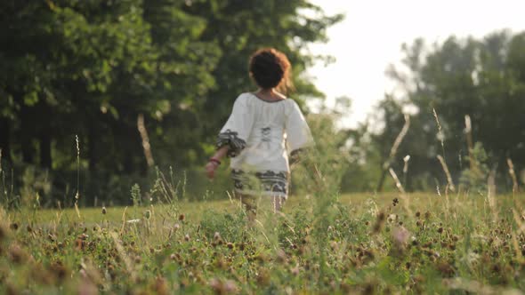 Girl running on a field