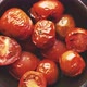Roasted Cherry Tomatoes Placed in a Ceramic Dark Bowl - VideoHive Item for Sale