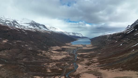 Mjoifjordur Fjord During Cloudy Day In East Of Iceland - aerial forward