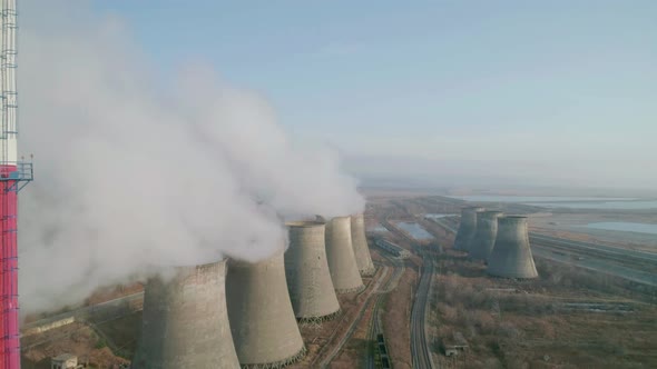 Aerial View of an Industrial Zone Pipes Pouring Thick White Smoke