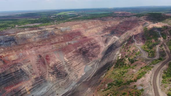 Aerial View on Huge Mining Quarry with Roads and Trees Around It Film Grain