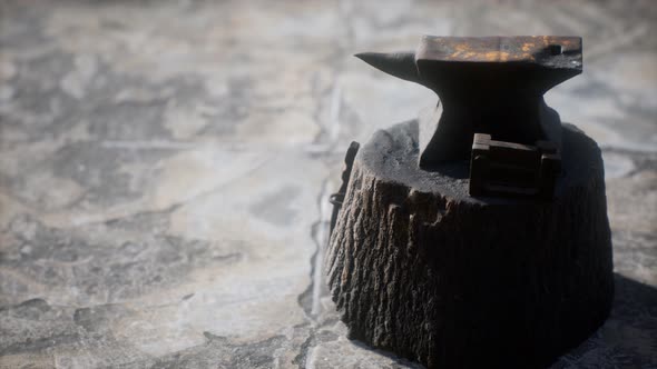 Old Anvil Attached To a Stump