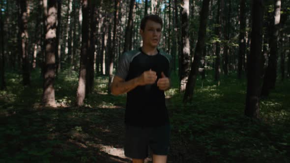 Young Handsome Man Train for Marathon Run in Park