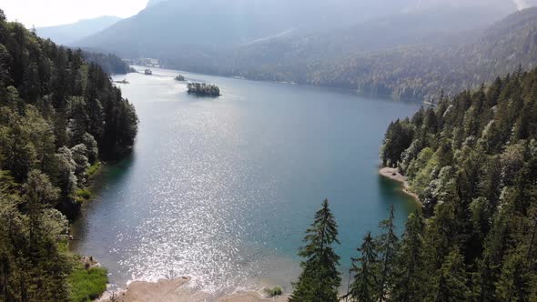 beautiful drone video of an lake and mountains, eibsee in bavaria