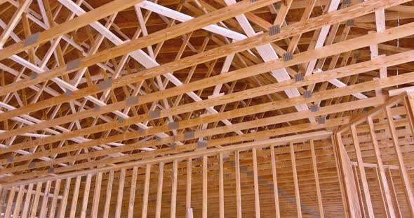 The Roof Trusses of a New Residential Building Under Construction are Seen on the Roof