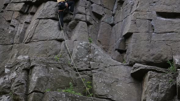 Rock Climber Reaches Top