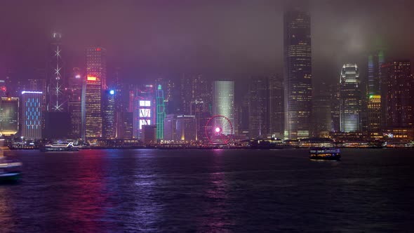 Hong Kong Victoria Harbour Skyline Urban Panorama TimeLapse Pan Up
