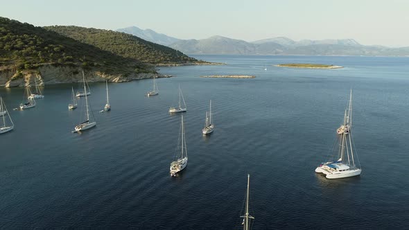 Aerial view of group of boats anchored in the mediterranean sea, Kastos island.
