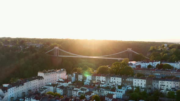 Cinematic dolly forward drone shot of Clifton suspension bridge Bristol at sunset