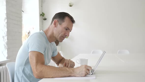 Man Writing on Documents Writer