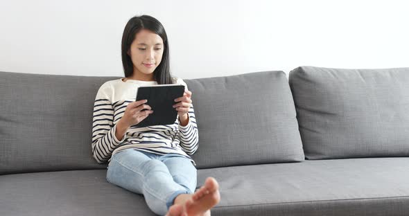 Woman Watching on Tablet Computer