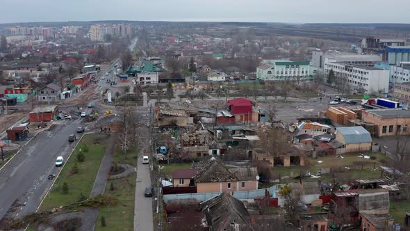 Aerial view of the road. Aerial view of the destroyed and burnt houses. alt